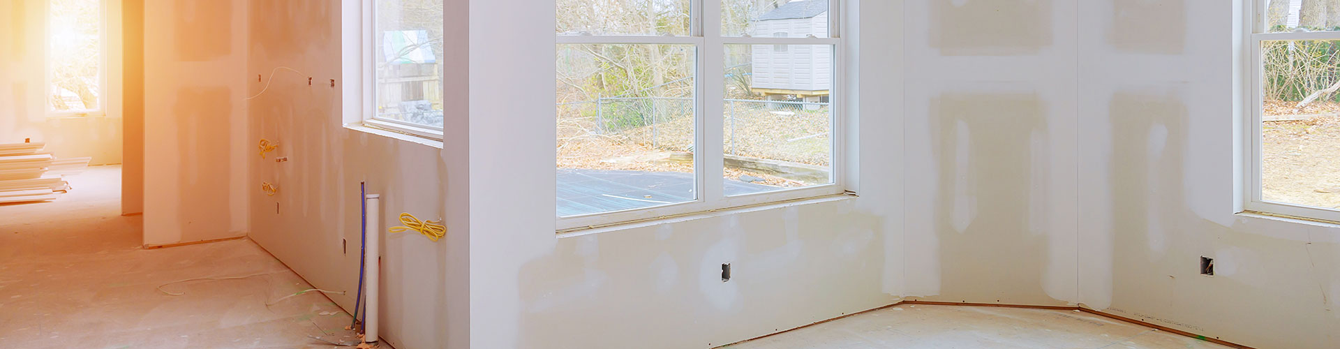 a room with window and freshly painted white wall in Glenview