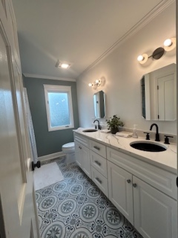 a bathroom upgrade with a sink, toilet, and tub in Park Ridge