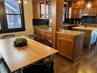 a renovated kitchen with table and stove in Lagrange