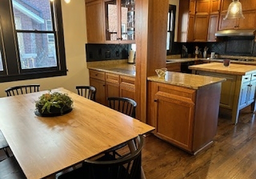 a renovated kitchen with table and stove in Lagrange