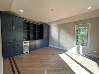 kitchen remodel with large window and hardwood floor in Des Plaines, IL
