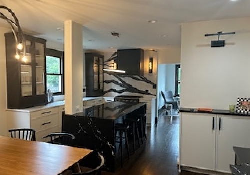 kitchen in Des Plaines, IL, featuring a stove, fridge, sink, and table