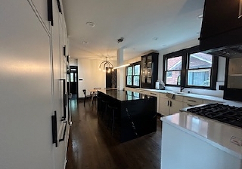 kitchen remodel with stove, sink, refrigerator, and microwave in Hinsdale