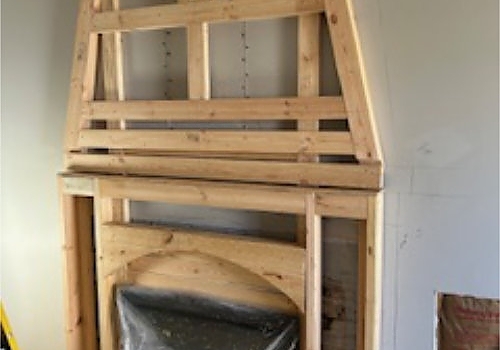 outdoor wooden bench installation by Plumb Tree Builders