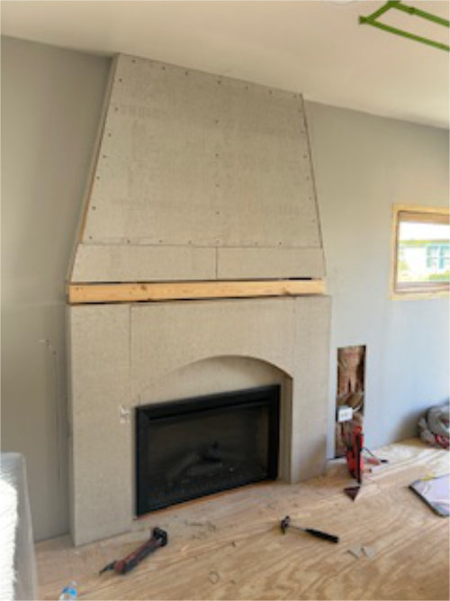fireplace remodel with brick wall and fireplace unit in Park Ridge