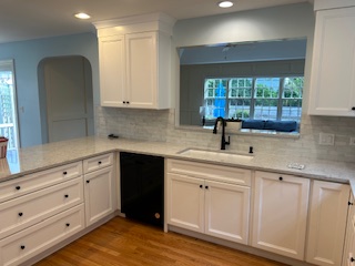 kitchen sink installation, wooden table, and chair in Park Ridge