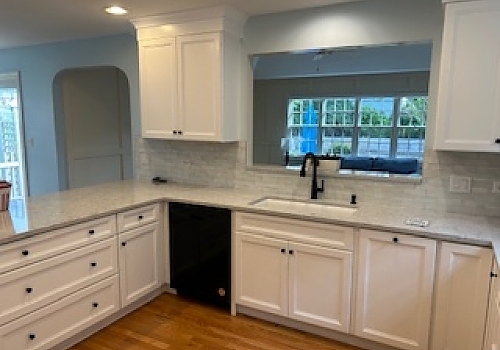 kitchen sink installation, wooden table, and chair in Park Ridge